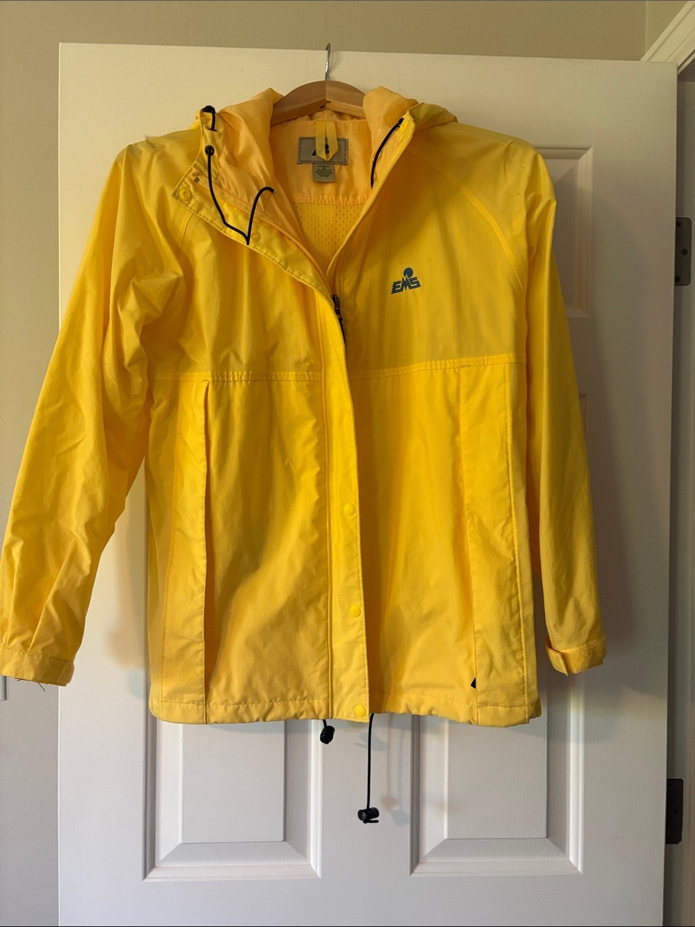Women’s bright yellow raincoat